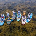 Chụp ảnh tập thể trên SUP trong bãi rong mơ